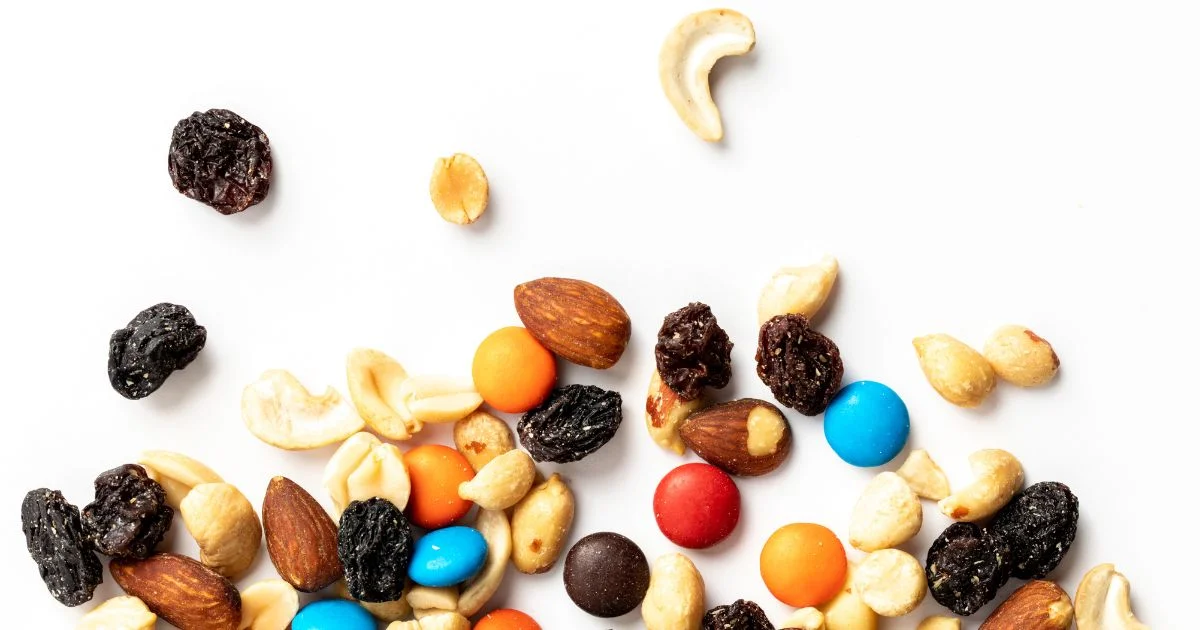 Assorted nuts and candies trail mix snack